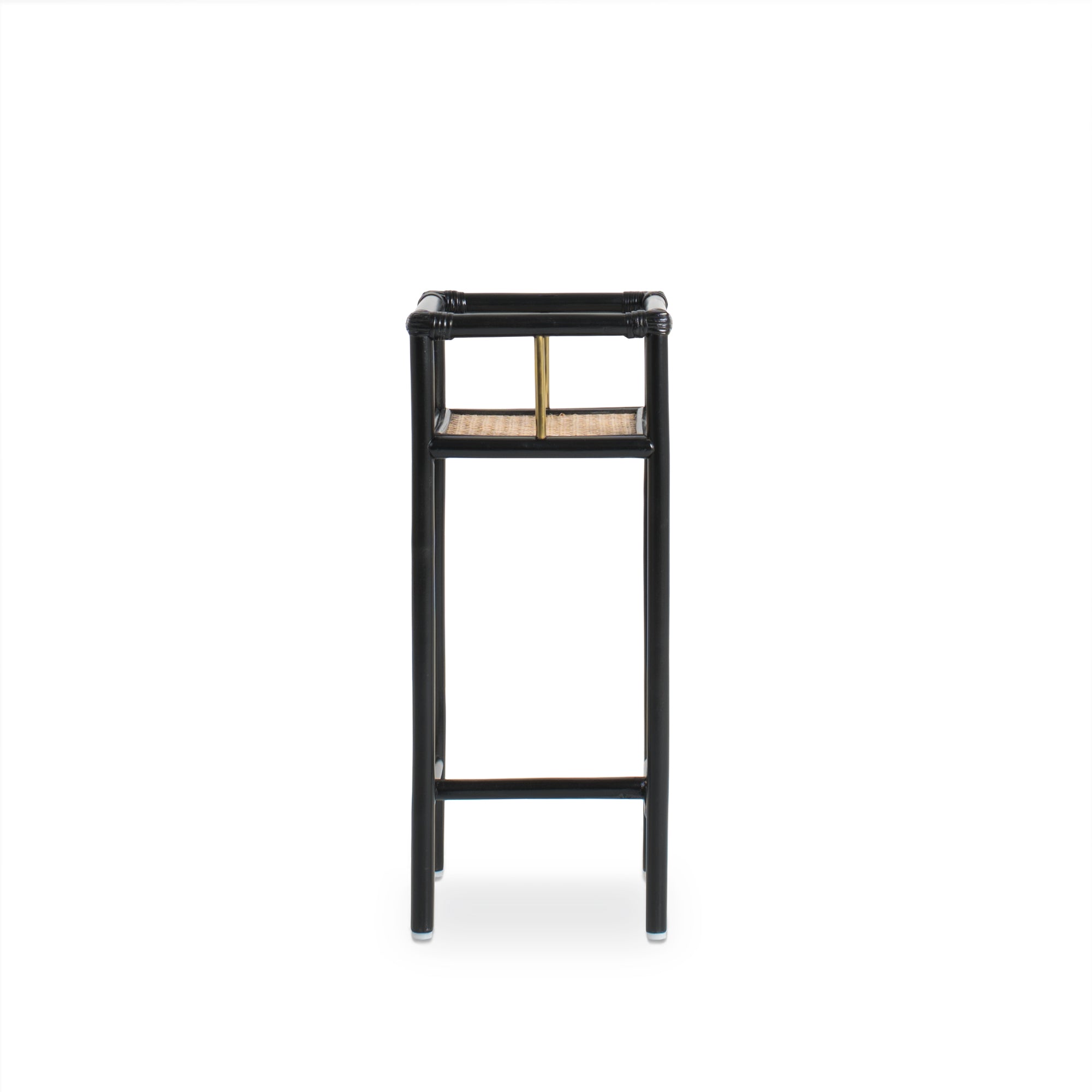 Modern black rattan planter featuring a sturdy frame and natural texture, perfect for housing your favorite plants. Designed with simplicity in mind, it adds a touch of warmth and elegance to any space. Created with eco-friendly materials, this piece blends sustainability with style. Designed in Singapore.