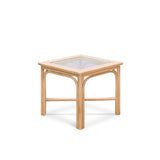 A handcrafted cane side table with tempered glass surface. A perfect blend of elegance and functionality, it adds warmth to any space while showcasing artisanal craftsmanship.
