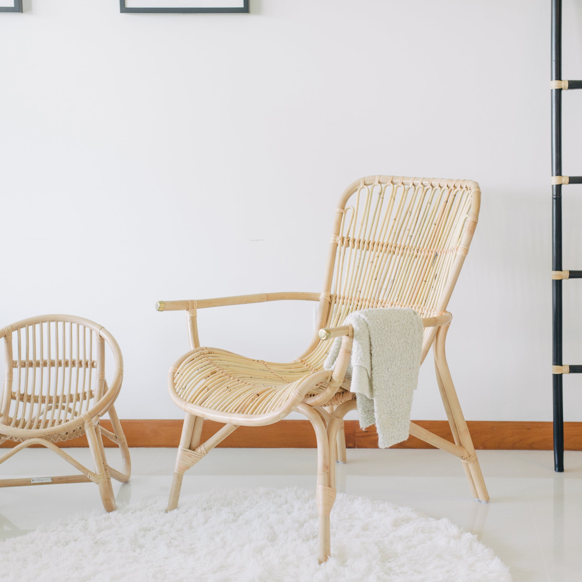 Handcrafted with natural rattan, this nostalgic cane chair brings timeless charm to any space. Designed in Singapore, it showcases artisanal craftsmanship with an airy frame and warm textures, perfect for relaxed living.