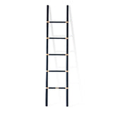 Designed in Singapore, this handcrafted black cane ladder showcases the beauty of rattan with a modern touch. Its sleek silhouette makes it a stylish, functional accent for any space, perfect for displaying throws, magazines, or decor with effortless charm. One of Nature Native's best-loved pieces.