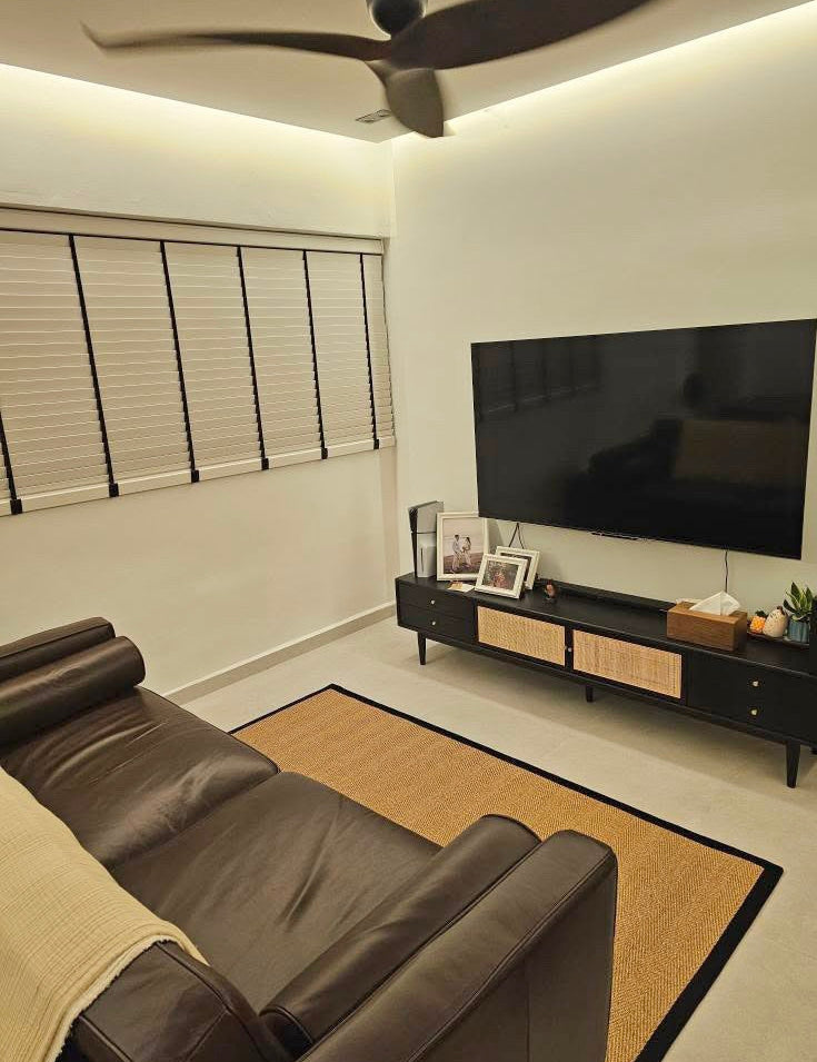 Custom MYRA Sisal Carpet in Coal Black in a living room