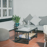 Stylish black rattan coffee table featuring a durable design with natural textures. Perfect for adding a touch of sophistication and warmth to any living space. Designed in Singapore, combining modern aesthetics with natural elements.