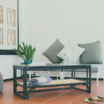 Stylish black rattan coffee table featuring a durable design with natural textures. Perfect for adding a touch of sophistication and warmth to any living space. Designed in Singapore, combining modern aesthetics with natural elements.
