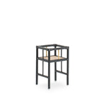 Modern black rattan planter featuring a sturdy frame and natural texture, perfect for housing your favorite plants. Designed with simplicity in mind, it adds a touch of warmth and elegance to any space. Created with eco-friendly materials, this piece blends sustainability with style. Designed in Singapore.