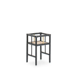 Modern black rattan planter featuring a sturdy frame and natural texture, perfect for housing your favorite plants. Designed with simplicity in mind, it adds a touch of warmth and elegance to any space. Created with eco-friendly materials, this piece blends sustainability with style. Designed in Singapore.