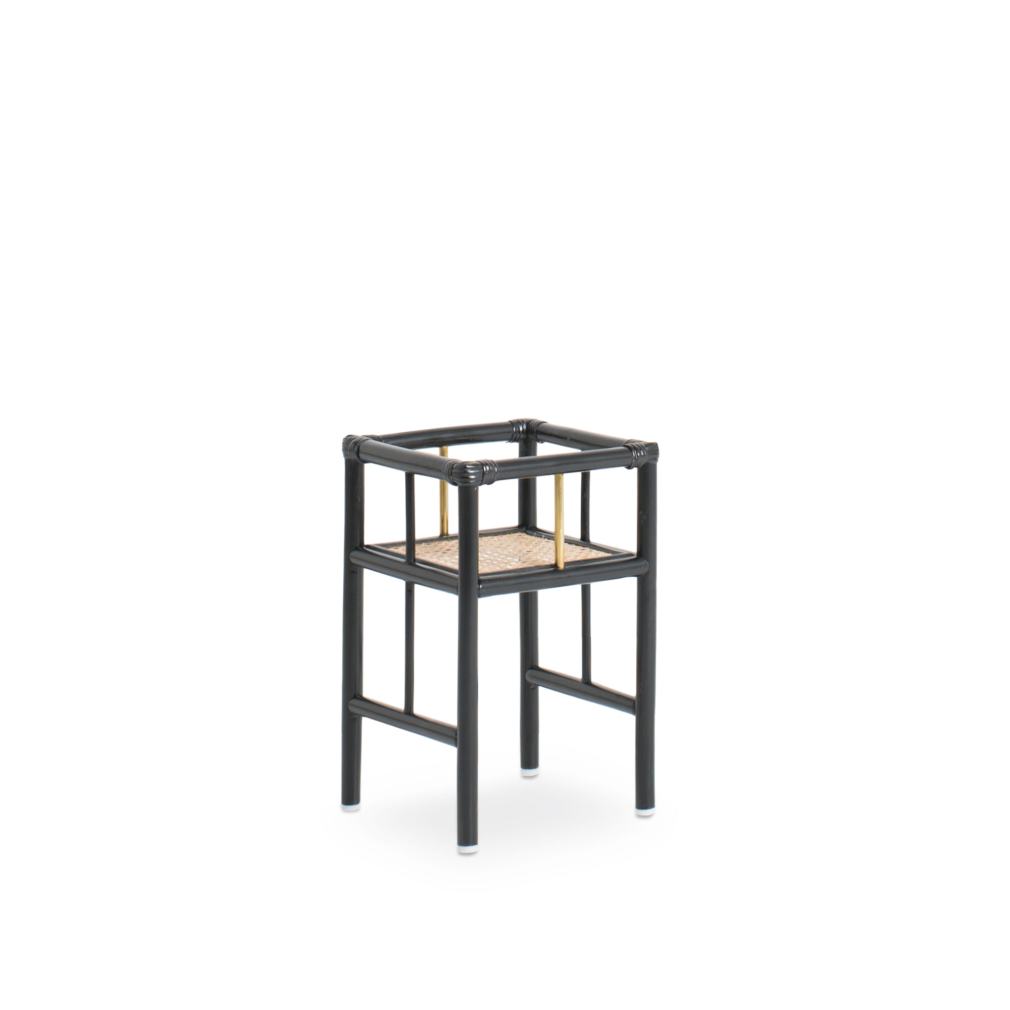 Modern black rattan planter featuring a sturdy frame and natural texture, perfect for housing your favorite plants. Designed with simplicity in mind, it adds a touch of warmth and elegance to any space. Created with eco-friendly materials, this piece blends sustainability with style. Designed in Singapore.