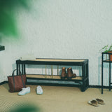 Black rattan shoe bench with an open-concept, double-layer design, offering ample storage for shoes and more. Designed in Singapore, it seamlessly blends natural elegance with functionality, perfect for modern entryways.