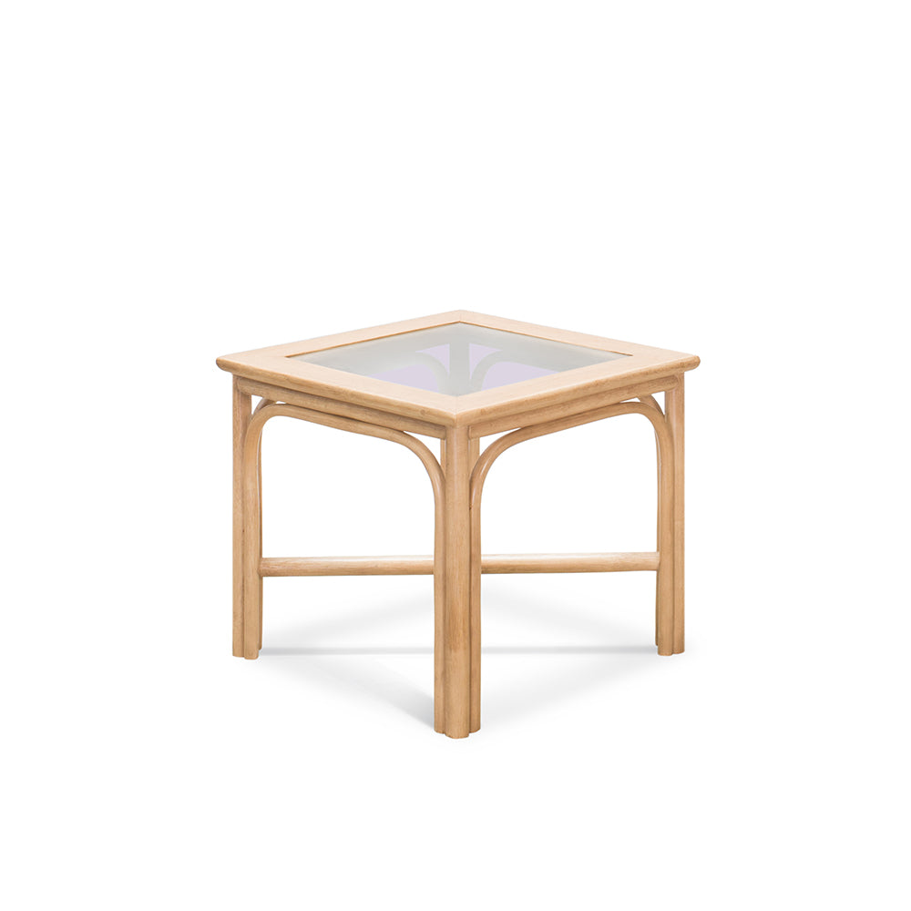 A handcrafted cane side table with tempered glass surface. A perfect blend of elegance and functionality, it adds warmth to any space while showcasing artisanal craftsmanship.